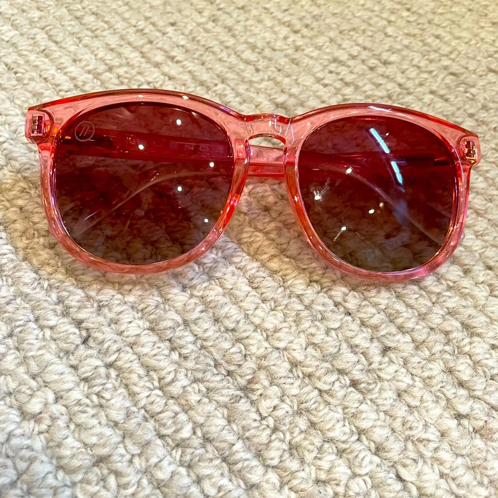 Pink Blenders sunglasses.